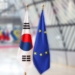 Banderas de la Unión Europea y Corea del Sur en un evento oficial