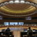 Reunión de ministros de Interior de la Unión Europea en un salón moderno